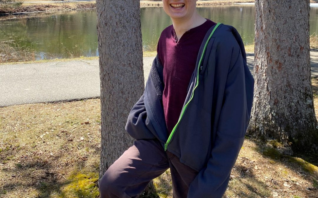 Craig Outside Standing In Front Of A Tree