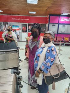 Sharifah at the airport in Kenya