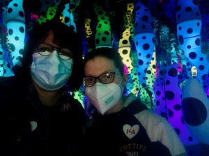 Two People With Glow In The Dark Background